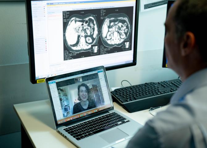 A doctor having a telehealth consultation with a patient 