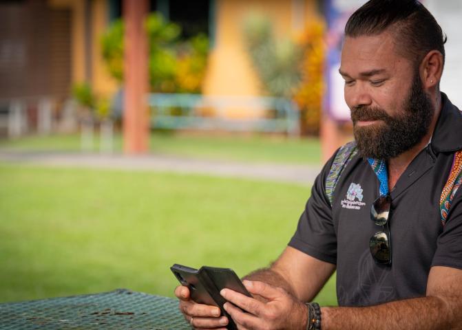 Photo: man on his phone