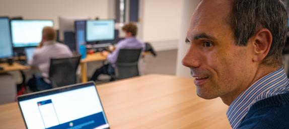 Photo: man with a laptop