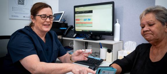 Photo: healthcare provider and patient