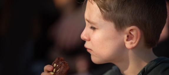 Boy eating a cookie