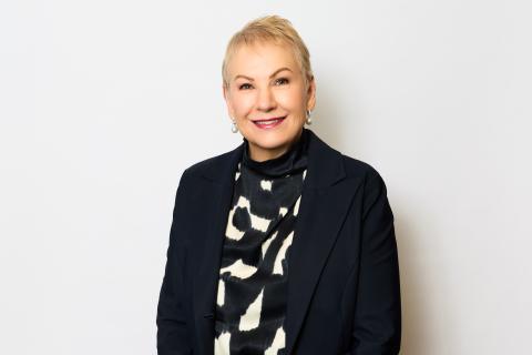 A portrait of Ms Lyn McGrath.