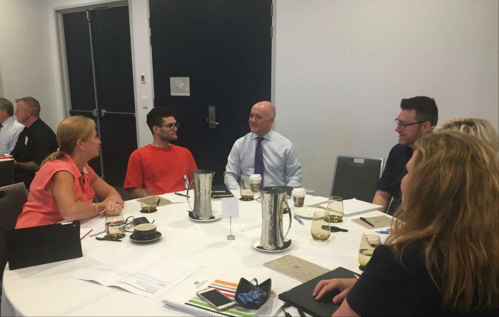 Agency CEO Tim Kelsey speaking with Harry Iles-Mann and attendees at the recent Listening Forum