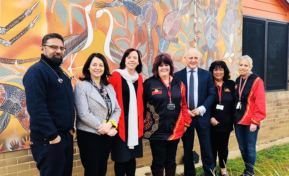 Meredith Makeham and Tim Kelsey meeting with the Winnunga Nimmityjah Aboriginal Health and Community Services team