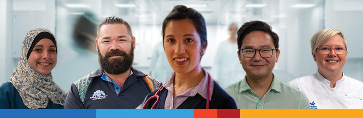 Five healthcare professionals standing in a bright hospital corridor, wearing varied attire including a headscarf, polo shirt, stethoscope, button-up shirt, and white coat.