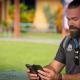 Photo: man on his phone